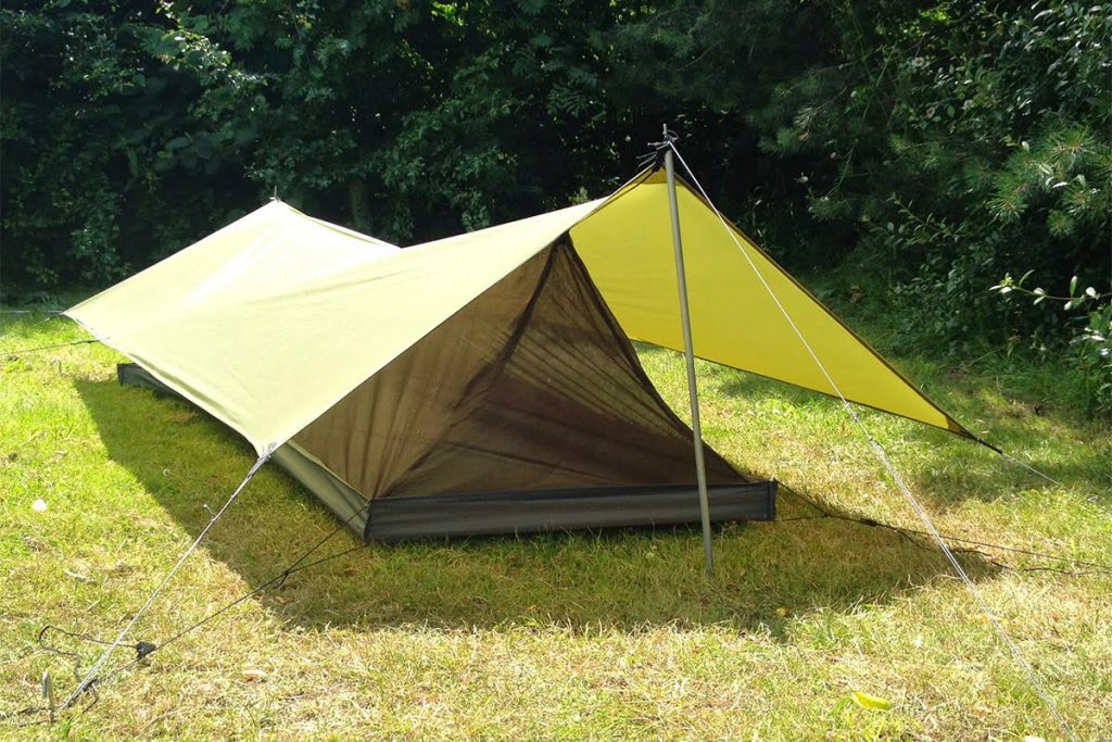 Mosquito tent and awning. This kit protects you from the rain and the mosquito, is perfectly ventilated, and is lighter than full-fledged tents with the same living space